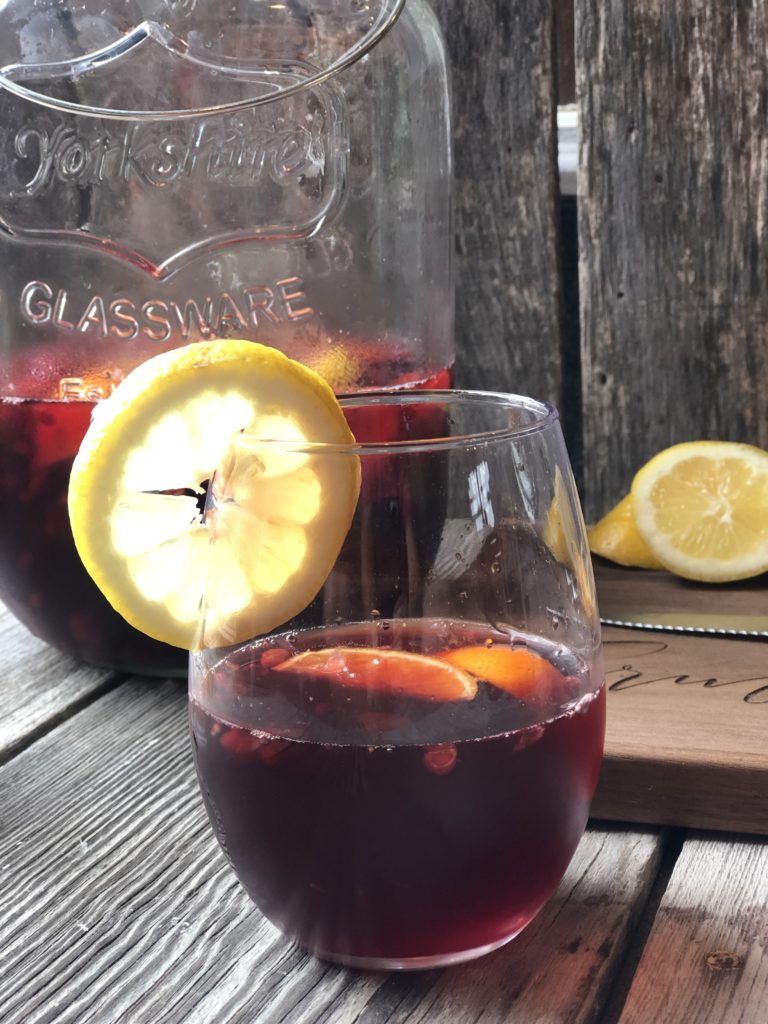Super Simple Sangria from Farmwife Feeds is the easiest cocktail for a crowd or to enjoy by yourself watching the world go by. #sangria #redwine #fruit #wine