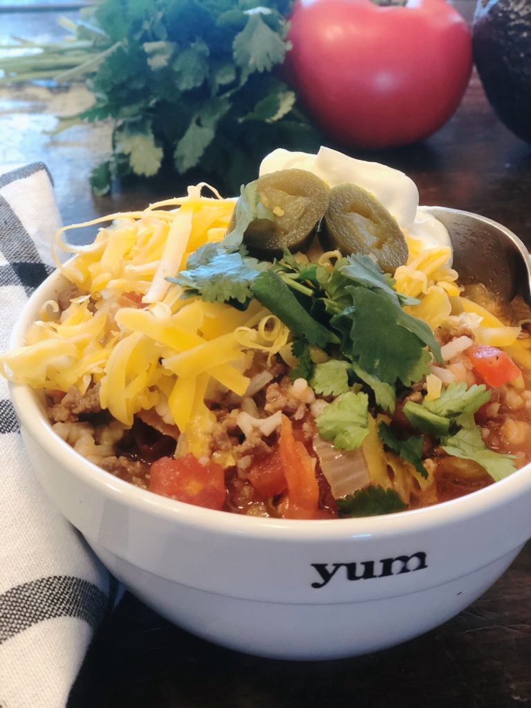 Mexican Beef Rice Soup from Farmwife Feeds is an easy soup that tastes summer fresh anytime of the year. #soup #mexican #salsa #rotel