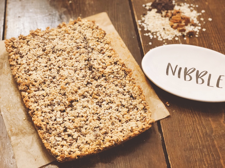 Sweetened Baked Granola Bars from Farmwife Feeds uses sweetened condensed milk hold these easy to make granola bars delicious. #granolabars #recipe #oats #snack