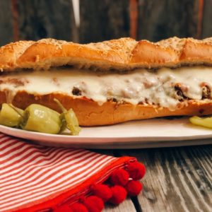 Easy Stromboli Sandwich from Farmwife Feeds, a family size sandwich that is simple to make and customize anyway your family likes. #recipe #grinder #sandwich