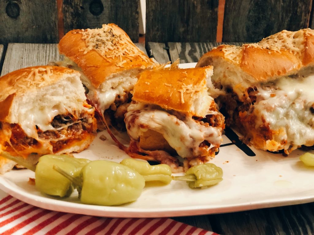 Easy Stromboli Sandwich from Farmwife Feeds, a family size sandwich that is simple to make and customize anyway your family likes. #recipe #grinder #sandwich