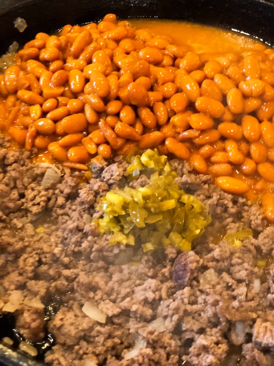 Ranch Beans, Beef and Cornbread Casserole from Farmwife Feeds is a one pan meal full of ground beef, seasoned beans and as much jalapeno kick as you want! #casserole #onepanmeal #groundbeef #castironskillet