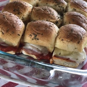 Hawaiian Pizza Sliders from Farmwife Feeds are a pizza take on slider sandwiches, easy to make and feed a crowd. #sliders #sandwiches #pizza