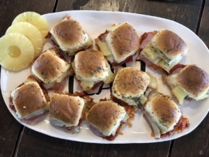 Hawaiian Pizza Sliders from Farmwife Feeds are a pizza take on slider sandwiches, easy to make and feed a crowd. #sliders #sandwiches #pizza