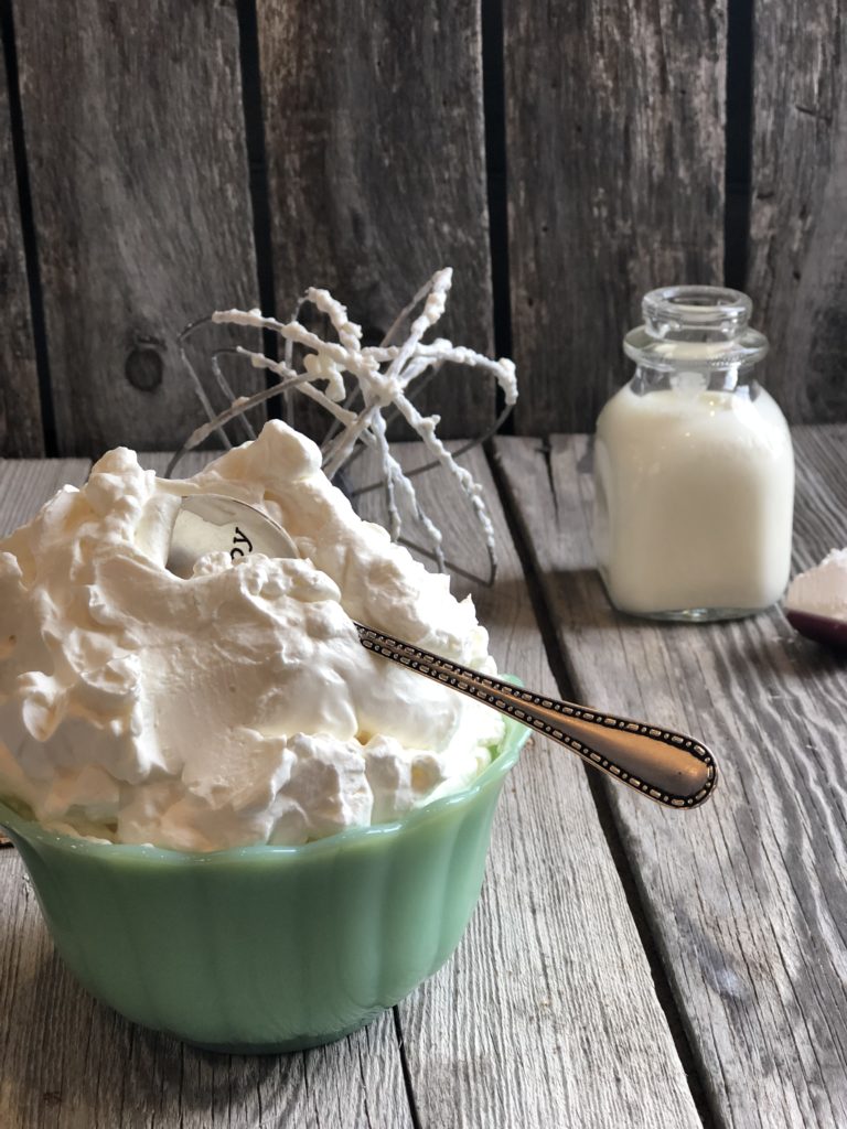 Homemade Whipped Cream from Farmwife Feeds is 3 simple ingredients to top off any sweet! #whippedcream #dairy #simple