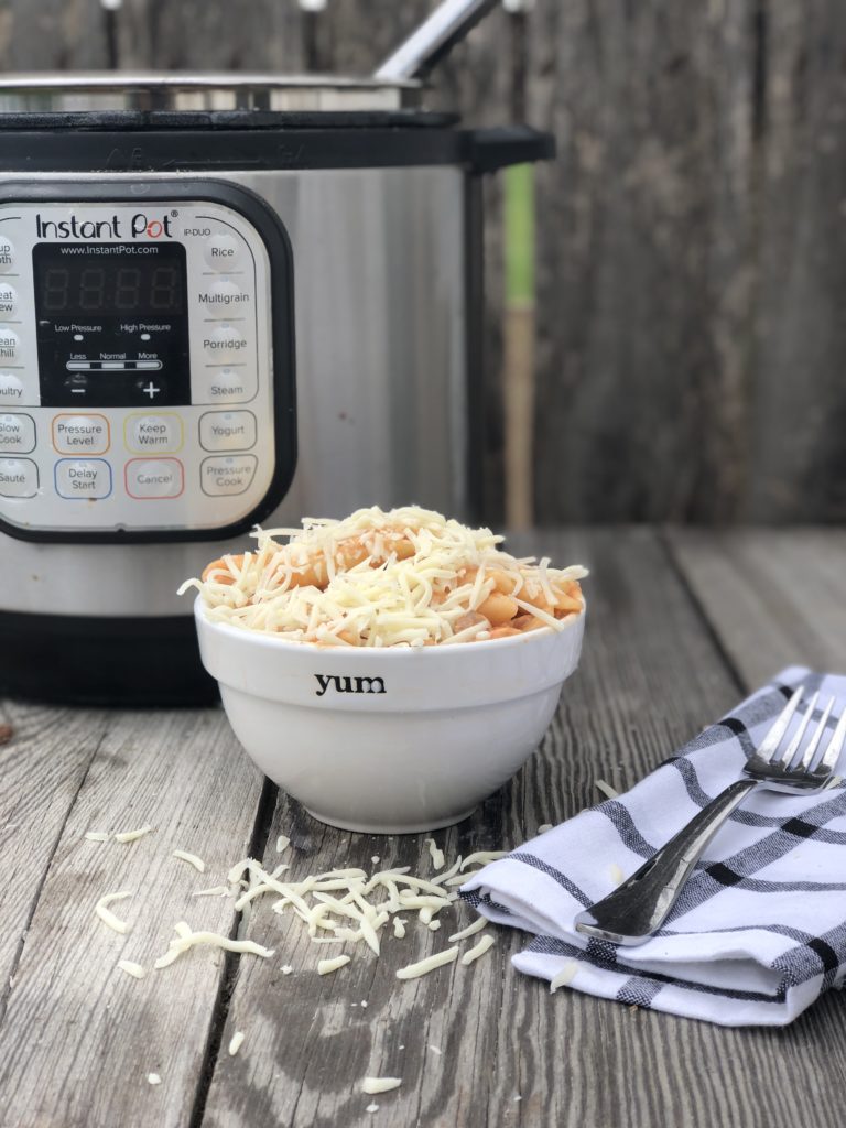 Instant Pot Beef Ziti from Farmwife Feeds is a cheesy hearty one pot meal ready for the table in less than 30 minutes. #instantpot #beef #pasta #recipe