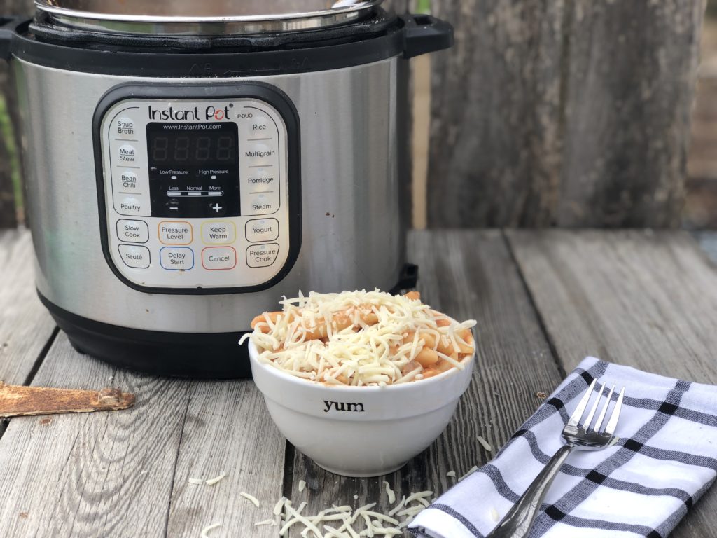 Instant Pot Beef Ziti from Farmwife Feeds is a cheesy hearty one pot meal ready for the table in less than 30 minutes. #instantpot #beef #pasta #recipe