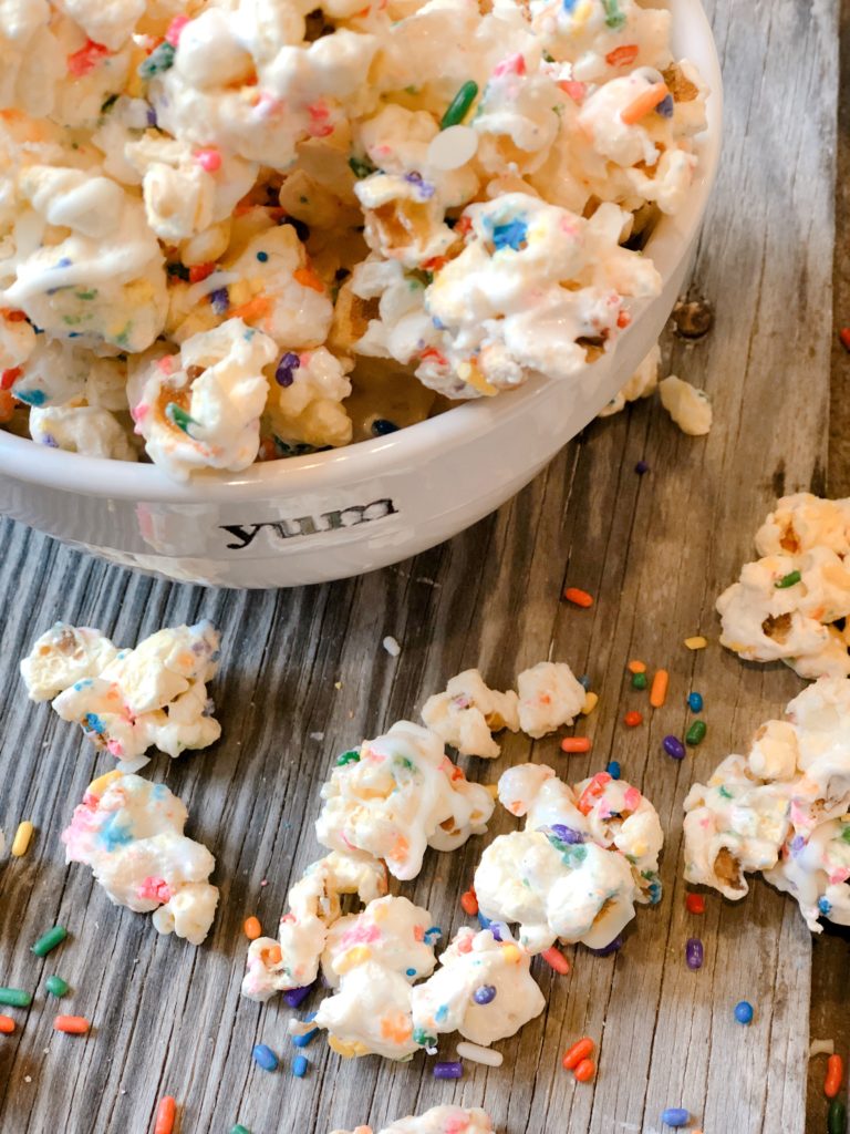 Marshmallow Funfetti Popcorn from Farmwife Feeds is a sweet, salty, sticky, full of sprinkles treat. #popcorn #sprinkles #marshmallow
