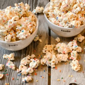 Marshmallow Funfetti Popcorn from Farmwife Feeds is a salty, sweet, chewy snack full of sprinkles, great for snacks or parties. #popcorn #sprinkles #marshmallow #treat