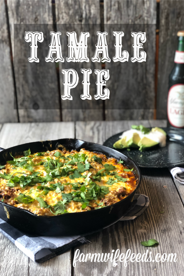 Tamale Pie from Farmwife Feeds made with easy homemade cornbread base, hamburger, enchilada sauce covered in cheese. #cornbread #beef #enchilada