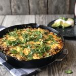 Tamale Pie from Farmwife Feeds made with easy homemade cornbread base, hamburger, enchilada sauce covered in cheese. #cornbread #beef #enchilada