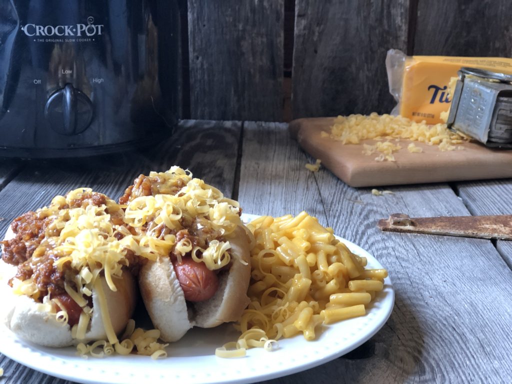 Traditional Coney Dog Sauce from Farmwife Feeds uses basic ingredients that simmer in the crockpot to make meat mixture perfect on hotdogs. #coneydog #crockpot #beef #hotdog