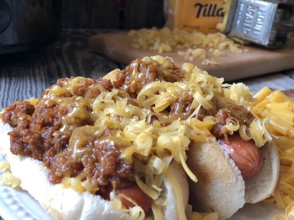 Traditional Coney Dog Sauce from Farmwife Feeds uses basic ingredients that simmer in the crockpot to make meat mixture perfect on hotdogs. #coneydog #crockpot #beef #hotdog