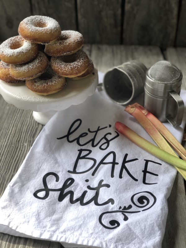 Homemade Rhubarb Donuts from Farmwife Feeds are super simple ingredients for a fresh baked donut full of rhubarb flavor that makes a great treat. #donut #homemade #bakeddonut #rhubarb