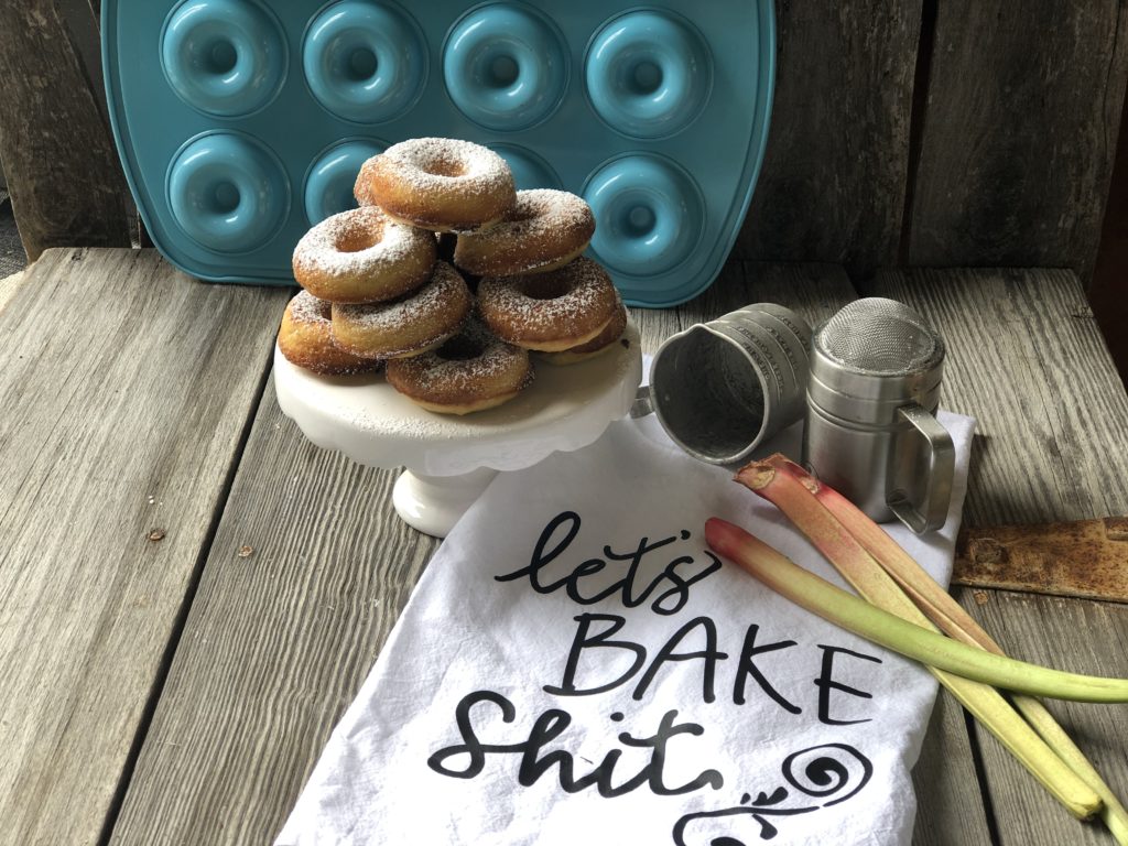 Homemade Rhubarb Donuts from Farmwife Feeds are super simple ingredients for a fresh baked donut full of rhubarb flavor that makes a great treat. #donut #homemade #bakeddonut #rhubarb