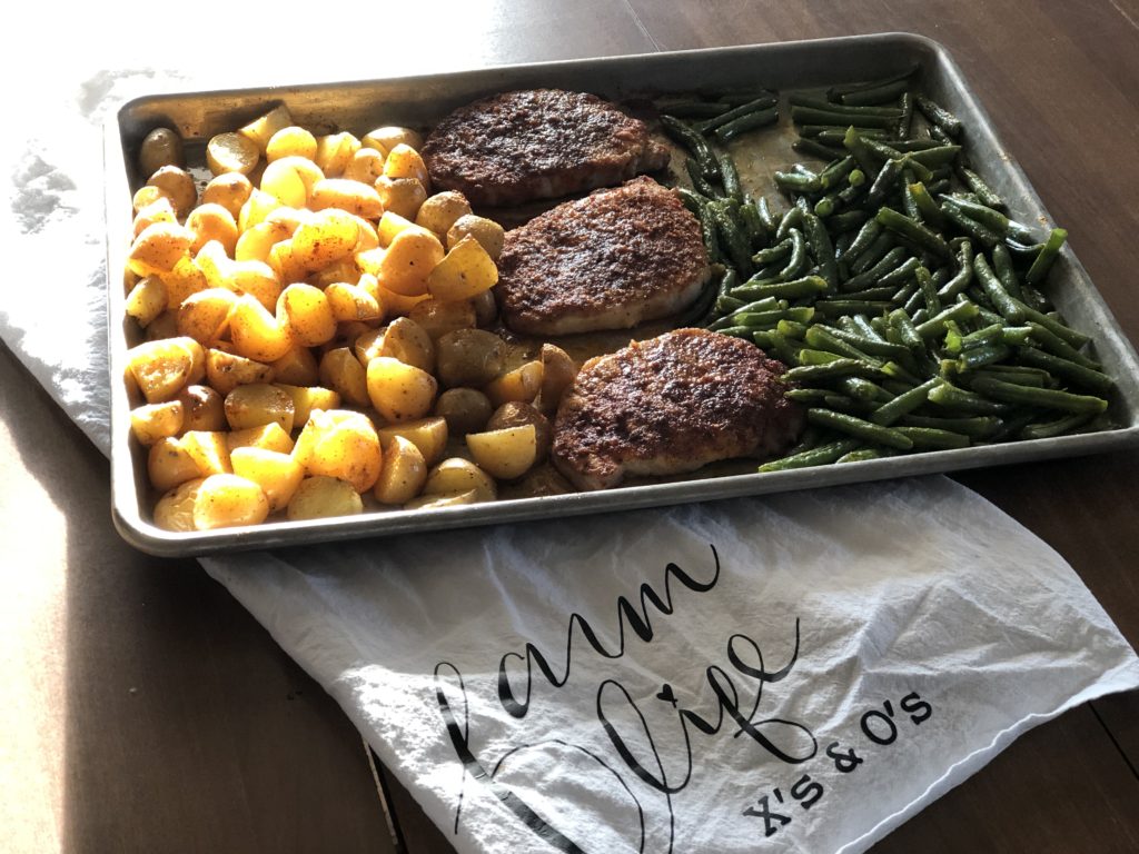 Sheet Pan Pork Chop Dinner from Farmwife Feeds is a one pan, 5 minute prep meal to feed the whole family. #pork #onepan #sheetpandinner