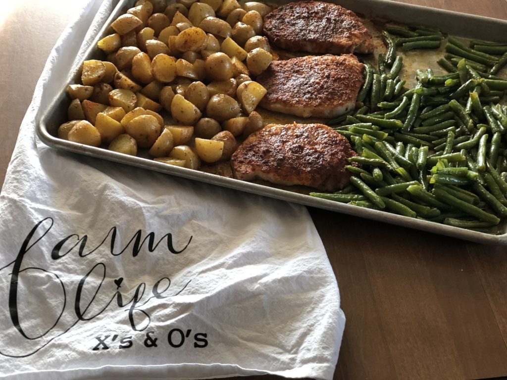 Sheet Pan Pork Chop Dinner from Farmwife Feeds is a one pan, 5 minute prep meal to feed the whole family. #pork #onepan #sheetpandinner