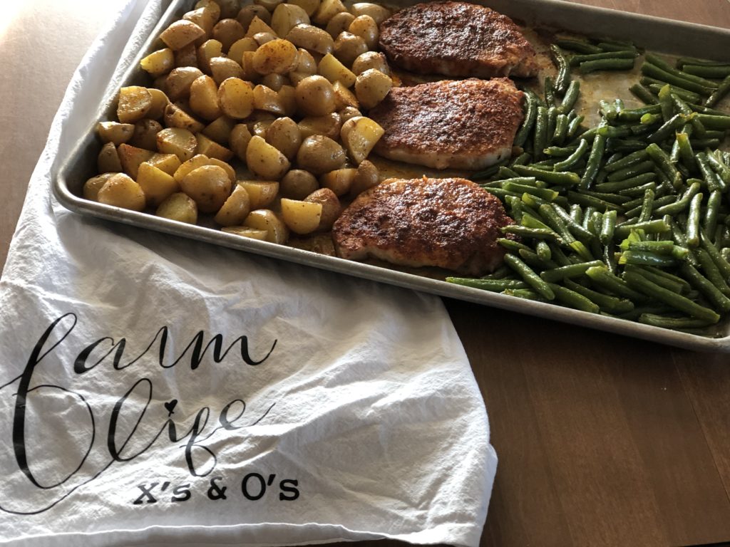 Sheet Pan Pork Chop Dinner from Farmwife Feeds is a one pan, 5 minute prep meal to feed the whole family. #pork #onepan #sheetpandinner