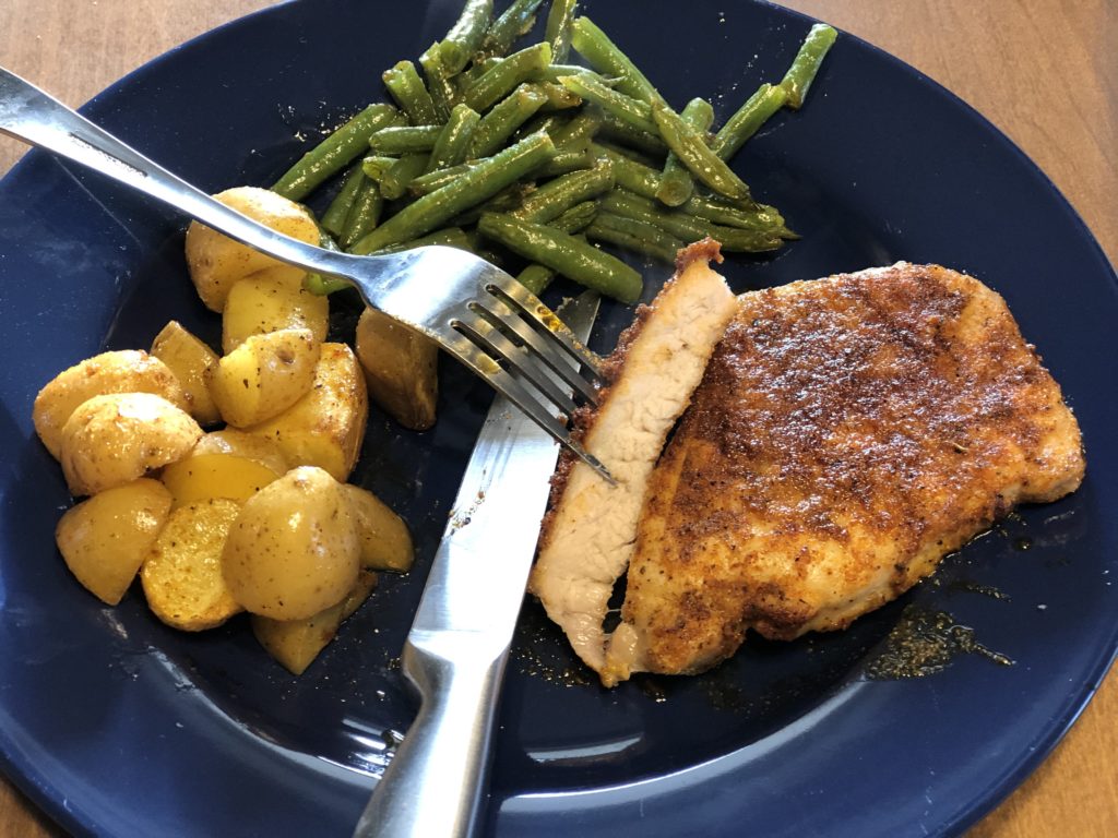 Sheet Pan Pork Chop Dinner from Farmwife Feeds is a one pan, 5 minute prep meal to feed the whole family. #pork #onepan #sheetpandinner