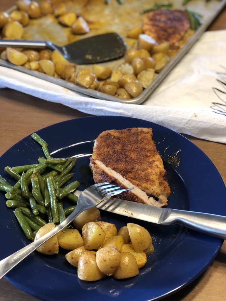 Sheet Pan Pork Chop Dinner from Farmwife Feeds is a one pan, 5 minute prep meal to feed the whole family. #pork #onepan #sheetpandinner