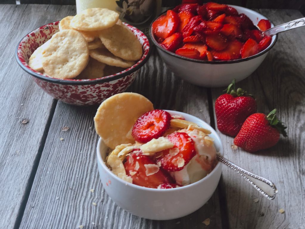 Strawberries and Pie Crust Cookies from Farmwife Feeds are a classic summer treat you eat with ice cream that everyone will love. #strawberries #strawberry #summertreat #icecream