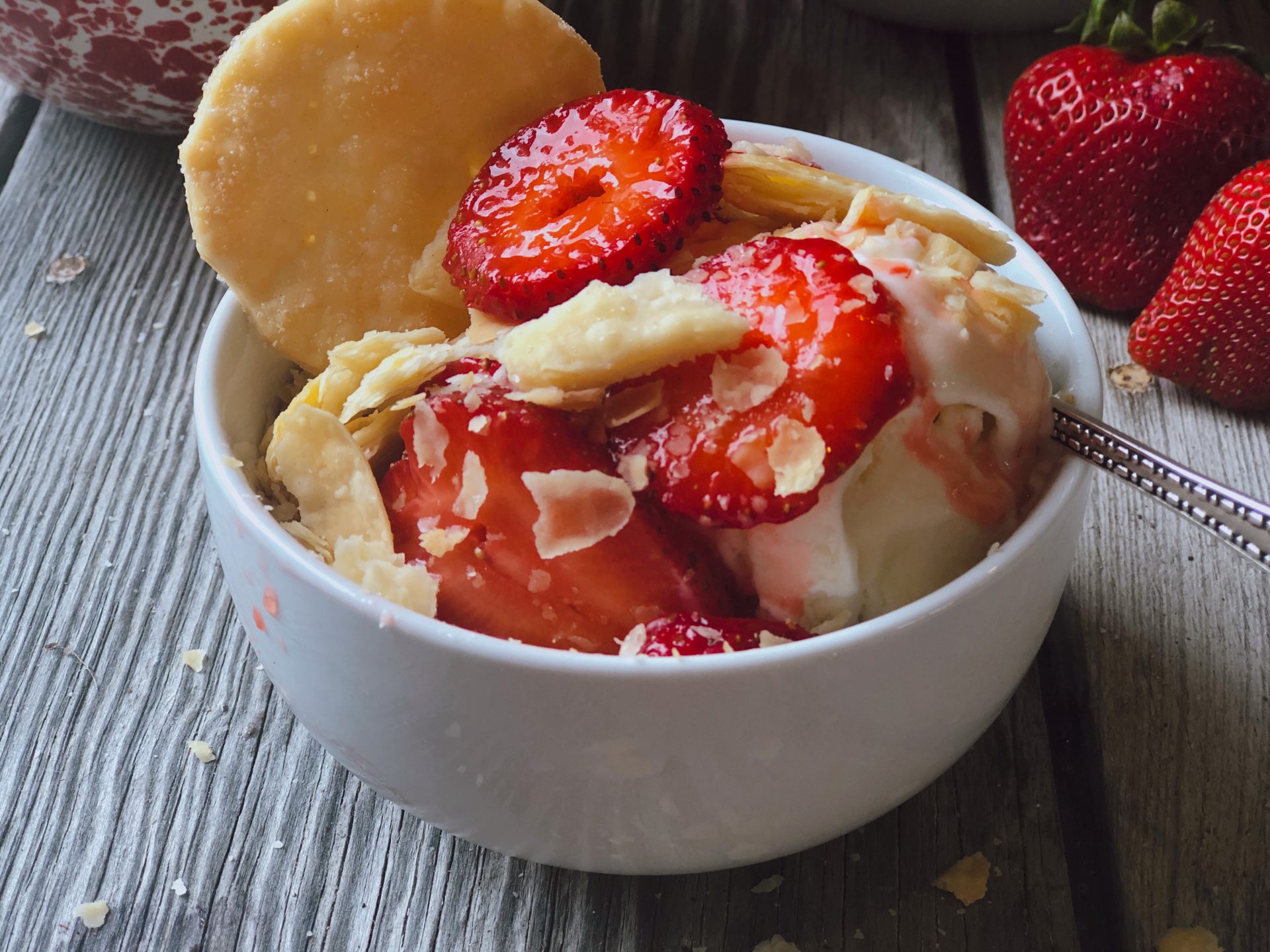 Strawberries and Pie Crust Cookies from Farmwife Feeds are a classic summer treat you eat with ice cream that everyone will love. #strawberries #strawberry #summertreat #icecream