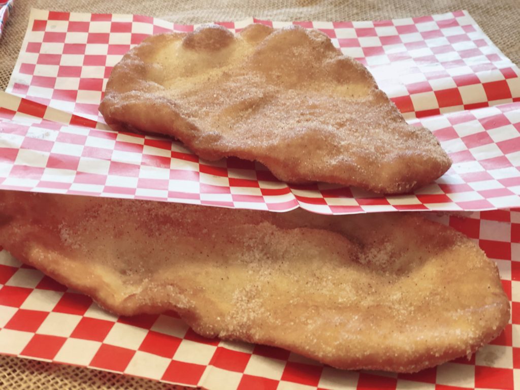 County Fair Beaver Tails from Farmwife Feeds is a cinnamon sugar coated deep fried classic you can enjoy at home. #fairfood #beavertail #friedpastry