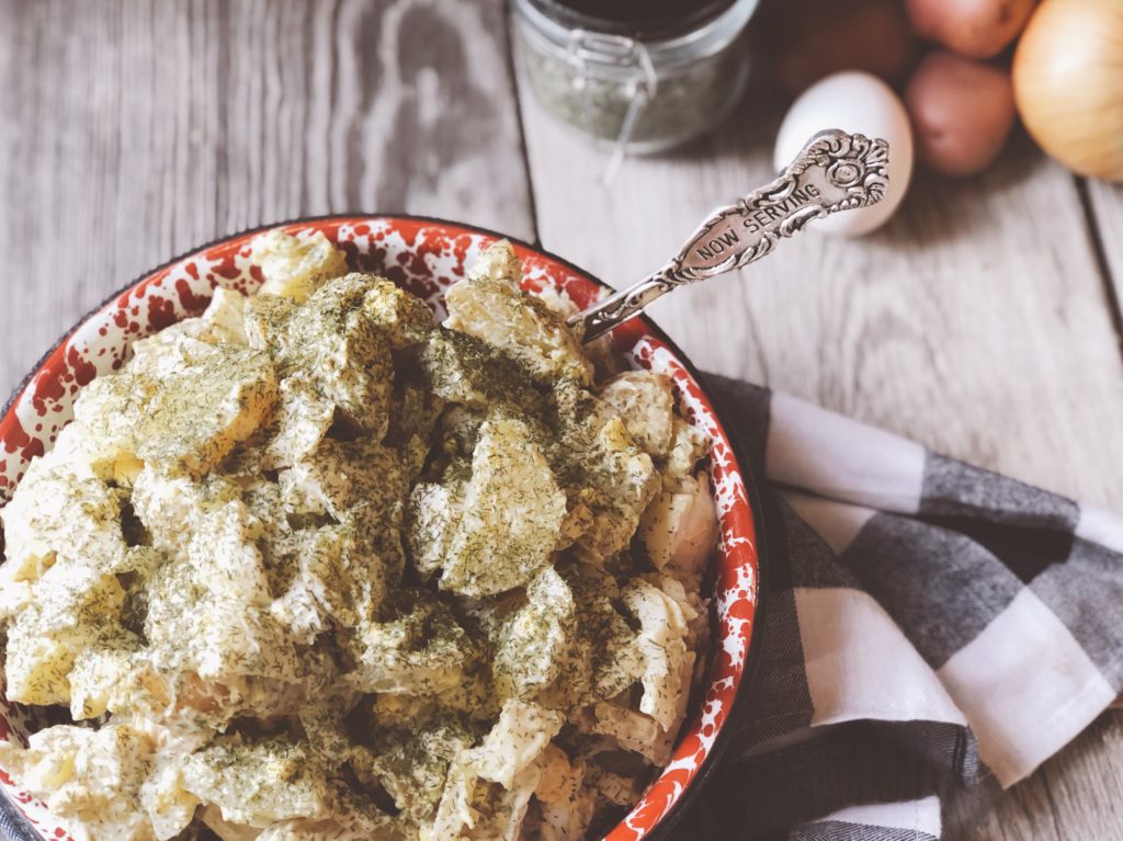 Dill Potato Salad from Farmwife Feeds is simple ingredients but not traditional potato salad with a kick of dill. #potatosalad #pitchin #picnic