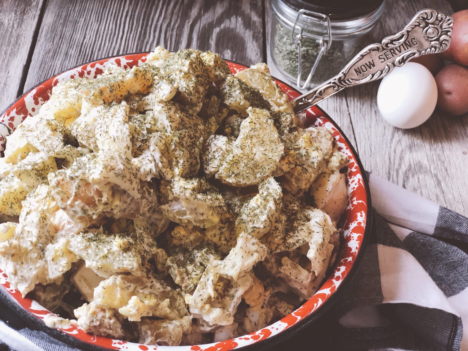 Dill Potato Salad from Farmwife Feeds is simple ingredients but not traditional potato salad with a kick of dill. #potatosalad #pitchin #picnic