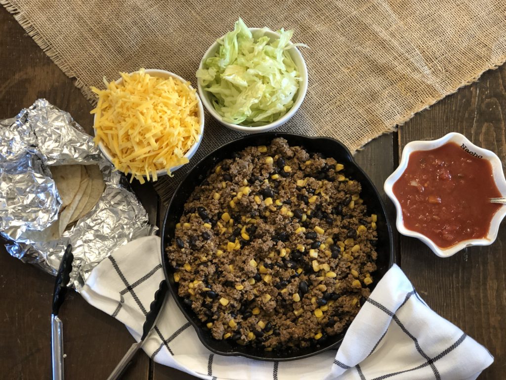Easy Loaded Skillet Taco Meat from Farmwife Feeds is a one pan meal loaded with meat, veggie and beans for an easy busy night meal for the family. #onepan #taco #mexican