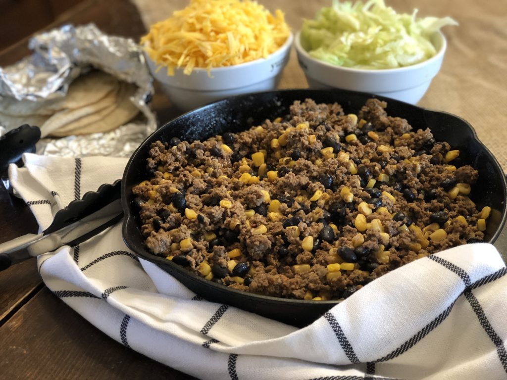 Easy Loaded Skillet Taco Meat from Farmwife Feeds is a one pan meal loaded with meat, veggie and beans for an easy busy night meal for the family. #onepan #taco #mexican