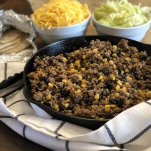 Easy Loaded Skillet Taco Meat from Farmwife Feeds is a one pan meal loaded with meat, veggie and beans for an easy busy night meal for the family. #onepan #taco #mexican