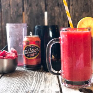Hard Lemonade Fruit Slushie from Farmwife Feeds is a refreshing cocktail for any occasion, even a Tuesday! #cocktail #hardlemonade #slushie #slushy