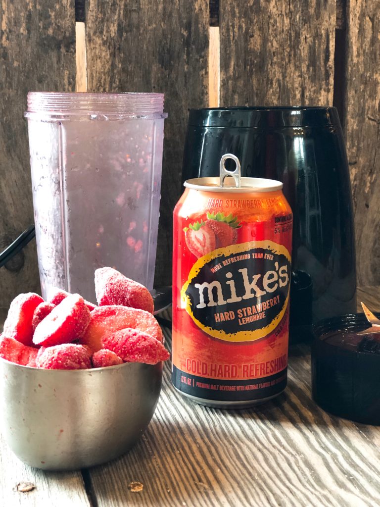 Hard Lemonade Fruit Slushie from Farmwife Feeds is a refreshing cocktail for any occasion, even a Tuesday! #cocktail #hardlemonade #slushie #slushy