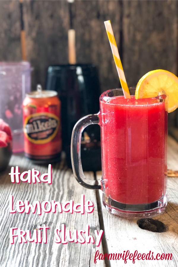 Hard Lemonade Fruit Slushie from Farmwife Feeds is a refreshing cocktail for any occasion, even a Tuesday! #cocktail #hardlemonade #slushie #slushy
