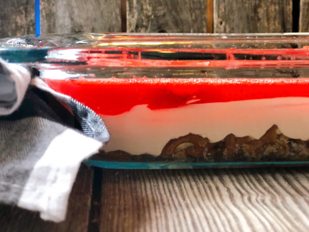 Strawberry Pretzel Salad from Farmwife Feeds, an easy 3 layer delicious dessert dish that hits the sweet, salty and fruit flavors. #strawberry #pretzel #salad #creamcheese