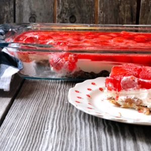 Strawberry Pretzel Salad from Farmwife Feeds, an easy 3 layer delicious dessert dish that hits the sweet, salty and fruit flavors. #strawberry #pretzel #salad #creamcheese