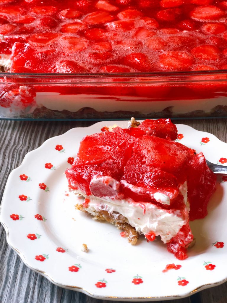 Strawberry Pretzel Salad from Farmwife Feeds, an easy 3 layer delicious dessert dish that hits the sweet, salty and fruit flavors. #strawberry #pretzel #salad #creamcheese
