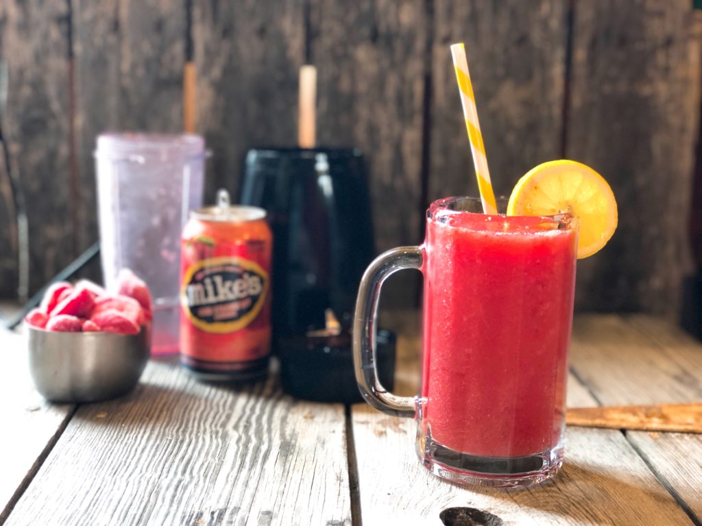 Hard Lemonade Fruit Slushie from Farmwife Feeds is a refreshing cocktail for any occasion, even a Tuesday! #cocktail #hardlemonade #slushie #slushy 