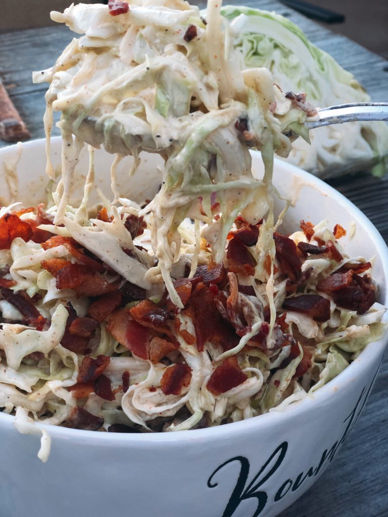 Smoky Bacon Slaw from Farmwife Feeds cabbage with smoky seasonings and crumbled bacon for the win. #slaw #cabbage #bacon