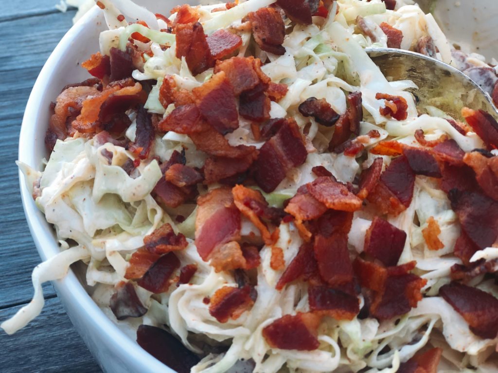 Smoky Bacon Slaw from Farmwife Feeds cabbage with smoky seasonings and crumbled bacon for the win. #slaw #cabbage #bacon