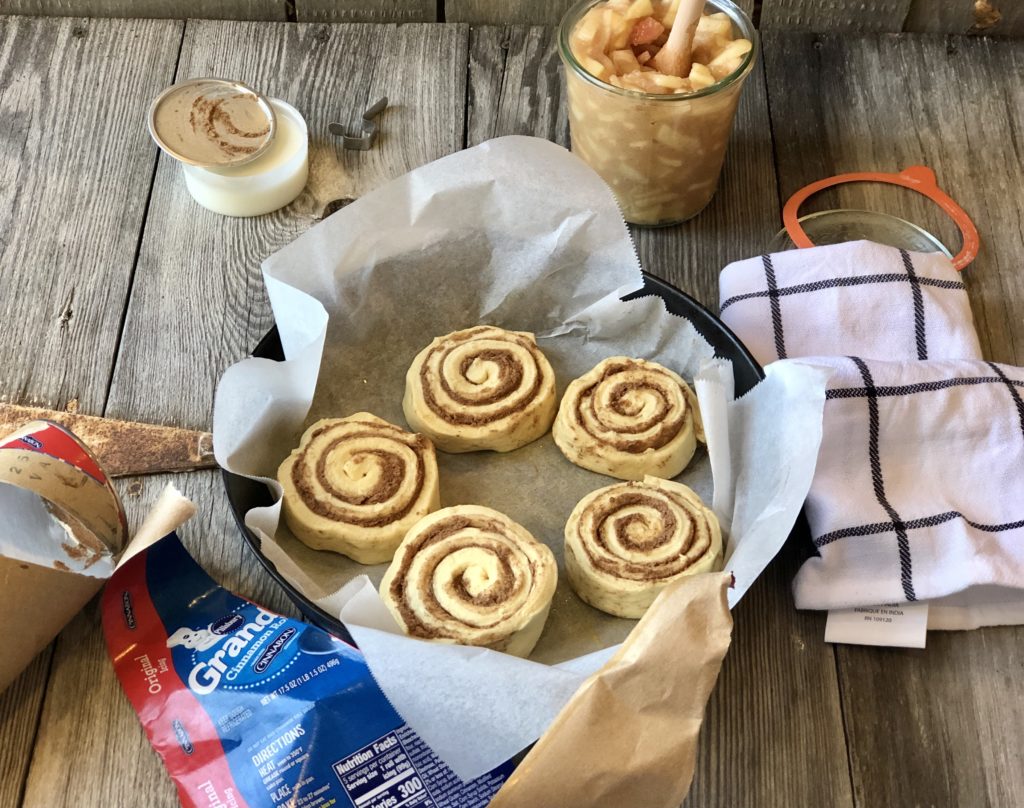 Easy Peasy Apple Pie Cinnamon Rolls from Farmwife Feeds taste like homemade, the perfect way to make semi-homemade for a delicious treat everyone will love. #cinnamonrolls #breakfast #semihomemade #applecinnamonrolles