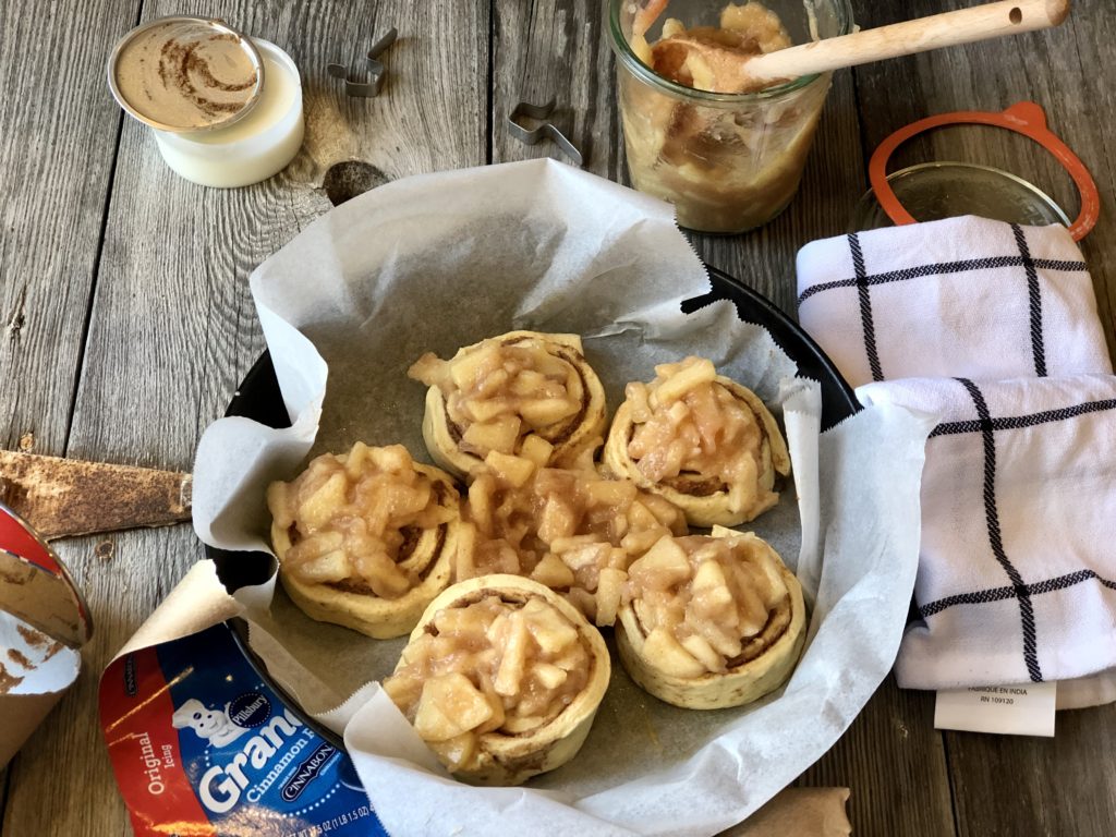 Easy Peasy Apple Pie Cinnamon Rolls from Farmwife Feeds taste like homemade, the perfect way to make semi-homemade for a delicious treat everyone will love. #cinnamonrolls #breakfast #semihomemade #applecinnamonrolles