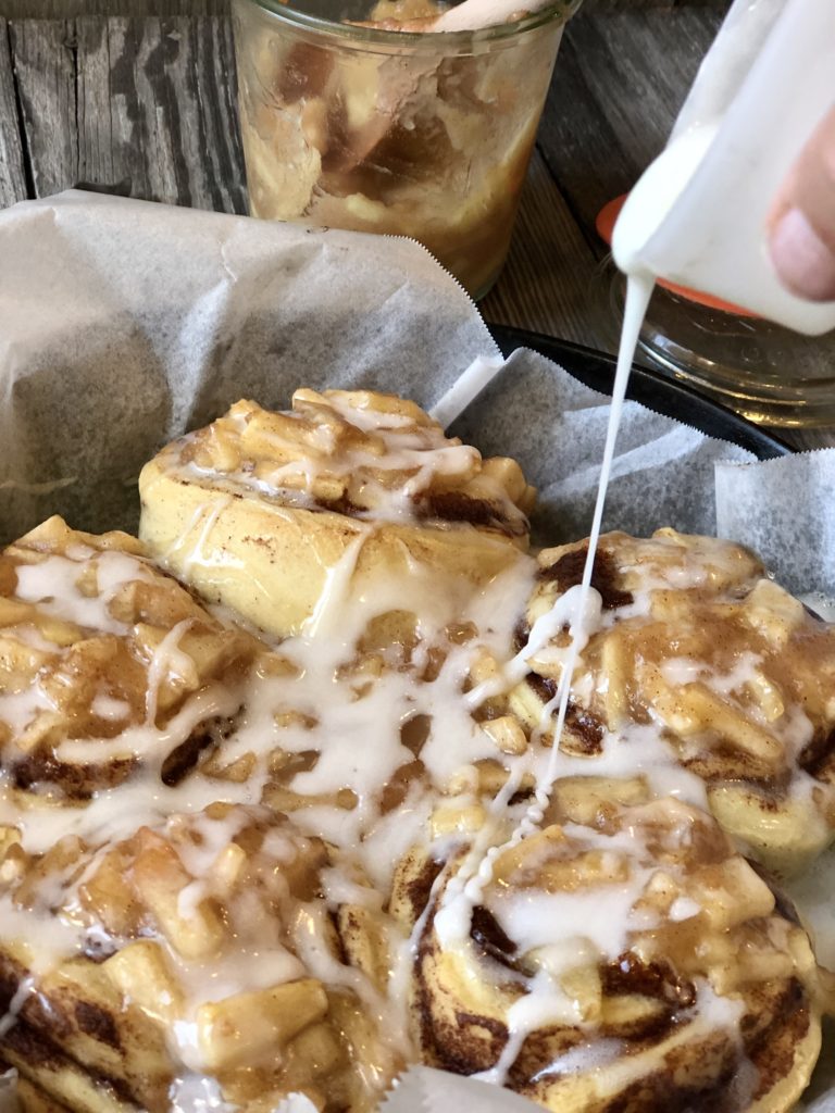 Easy Peasy Apple Pie Cinnamon Rolls from Farmwife Feeds taste like homemade, the perfect way to make semi-homemade for a delicious treat everyone will love. #cinnamonrolls #breakfast #semihomemade #applecinnamonrolles