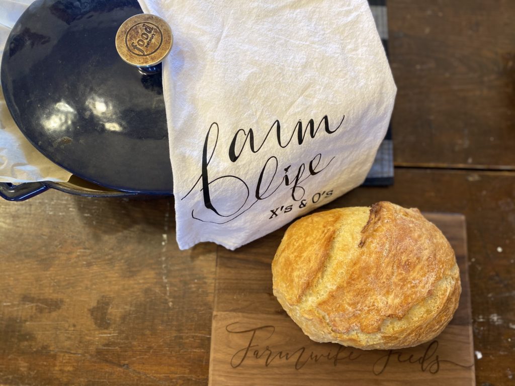 Crusty No Knead Dutch Oven Bread from Farmwife Feeds is a simple 4 ingredient recipe for fresh homemade artisan bread. #homemade #dutchoven #bread #artisan 