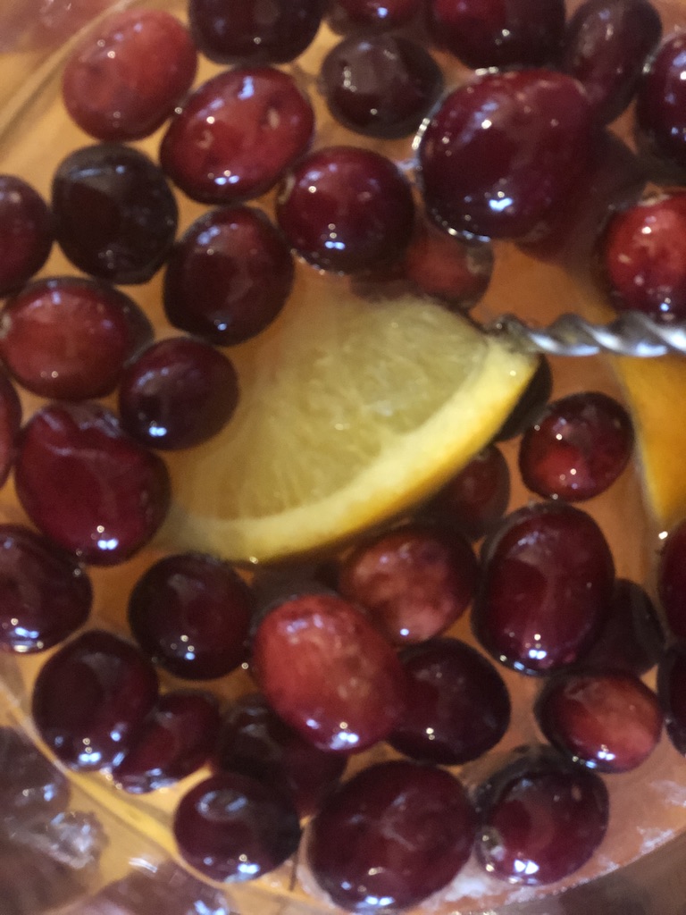 Sparkling Cranberry Sangria from Farmwife Feeds, cranberries and oranges flavor moscato topped off with your favorite bubbly. #sangria #wine #cocktail