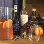Sparkling Cranberry Sangria from Farmwife Feeds, cranberries and oranges flavor moscato topped off with your favorite bubbly. #sangria #wine #cocktail