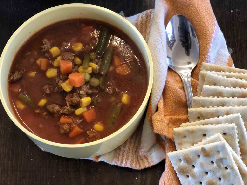 Easy Hamburger Vegetable Soup from Farmwife Feeds, a hearty quick stovetop soup for an easy meal. #soup #vegetable #hamburger #groundbeef