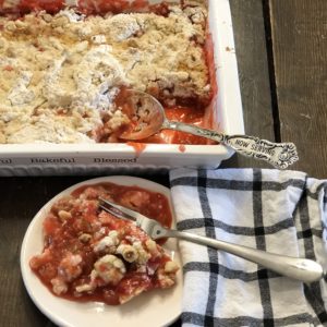Strawberry Rhubarb Cobbler from Farmwife Feeds, an easy church cookbook dessert that you assemble right in the baking dish. #rhubarb #strawberry #dessert