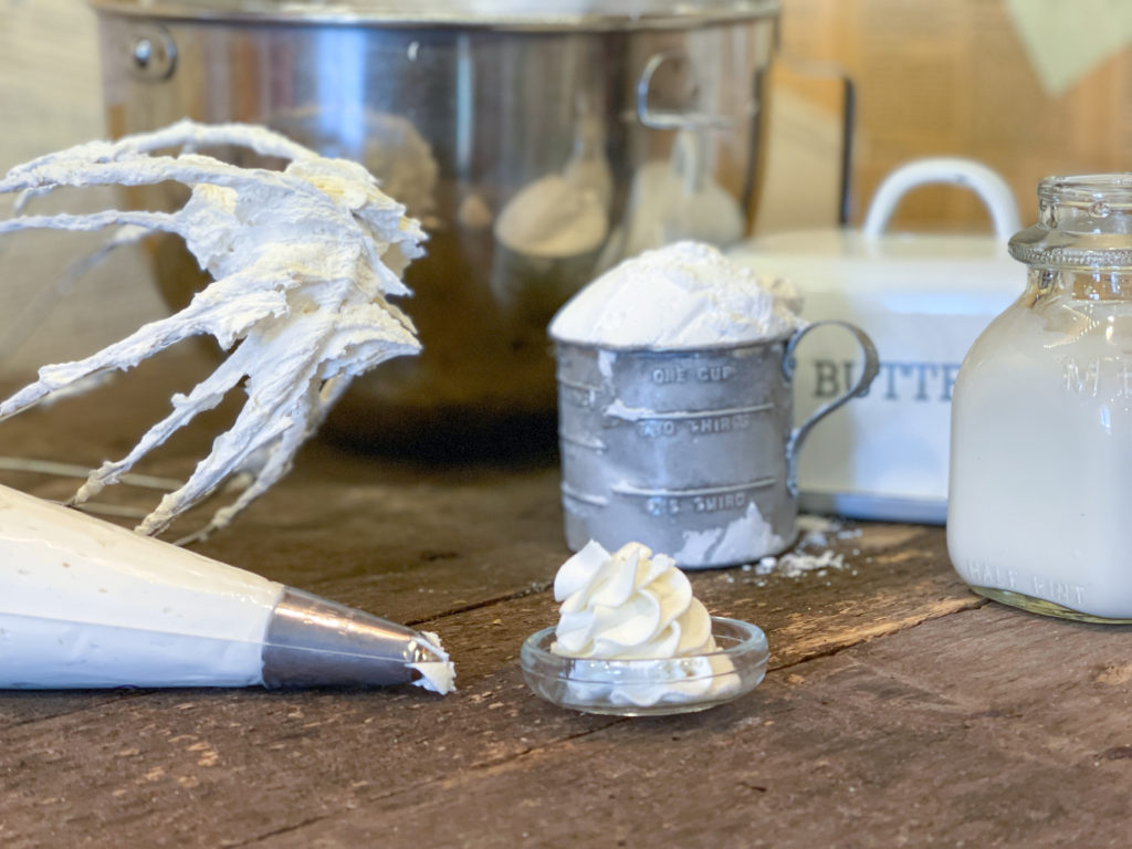 Classic Buttercream Frosting from Farmwife Feeds, creamy rich icing made with 4 simple ingredients that come together in less than 10 minutes. #frosting #buttercream #easyrecipe #icing